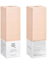 Light pink product box for ginseng essence water, front and back views