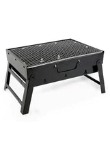 Folding BBQ grill with dark metal grate, folding legs, and side carry handle