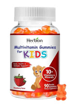 Kids multivitamin gummy bottle with orange gummies and strawberry flavor label