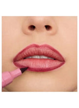 Pink lip liner stain applied on lips, pencil tip touching lower lip