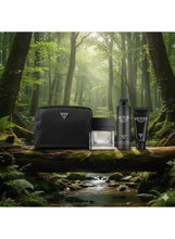 Men’s Guess fragrance gift set with black zip pouch, EDT bottle, spray bottle, and tube