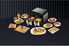 Dual-zone air fryer with multiple plated foods surrounding it