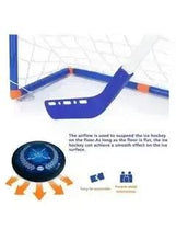 Kids air hockey goal and launcher toy with blue board and dark blue puck