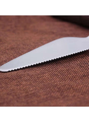 Huitich 2 piece cake serving utensils with serrated stainless steel knife blade on brown fabric
