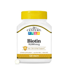 Biotin 10,000 mcg supplement bottle with yellow cap