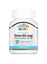 Iron supplement bottle with Iron 65 mg label, 120 tablets, gluten free