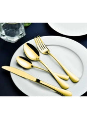 Huitich gold flatware set on white plate featuring 24-piece dinnerware set with stand for elegant dining