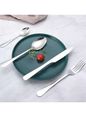 Huitich 24-piece dinnerware set with stand includes polished stainless steel fork knife and spoons on green plate