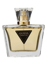 GUESS Seductive eau de toilette bottle, gold cap, black triangle label