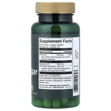 Swanson supplement facts label on dark green bottle with gold cap