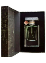 Unisex eau de parfum bottle with 'ATLAS' cap in open box