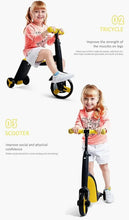 Kids 3-wheel tricycle balance bike with yellow grips and black frame, child riding
