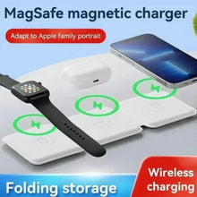 3-in-1 wireless charger with white pads and black watch band, shown charging