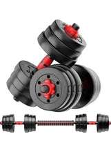Adjustable dumbbell showing black plates and red pin on rotating handle