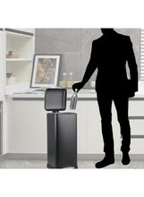 Pedal trash bin with closed lid and foot pedal base, dark finish