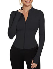 Black long-sleeve sports top with half-zip front and fitted bust panels
