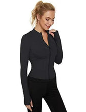 Black long-sleeve sports top with half-zip front and contoured seams