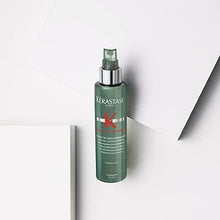 Kerastase Genesis Homme thickening hair spray bottle with metallic spray cap