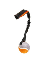 Dog tug toy ball with orange and grey fabric ball and black rope handle