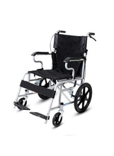 Foldable transport wheelchair with black fabric seat, armrests, and silver frame