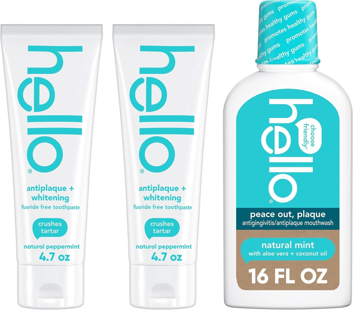 Antiplaque whitening fluoride-free toothpaste tubes and natural mint mouthwash bottle