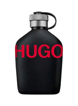 Men's eau de toilette bottle with ribbed silver cap and HUGO red label