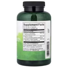 Green supplement bottle with black cap and Supplement Facts label