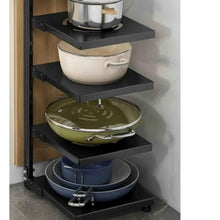 Black steel 4-tier kitchen rack with stacked shelves holding cookware