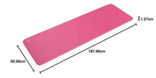 Pink yoga mat with length and thickness measurement markers