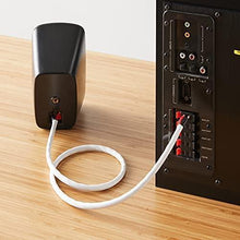 Audio speaker wire cable connecting to speaker binding posts with red/black cores