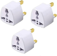 Pack of three white travel plug adapters with international slots and gold pins
