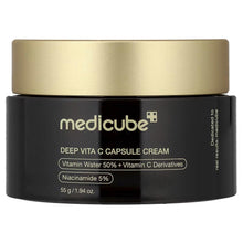 Medicube Deep Vita C Capsule Cream jar, black with gold lid