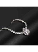 Silver crystal pendant necklace close-up with round cluster crystal pendant on links