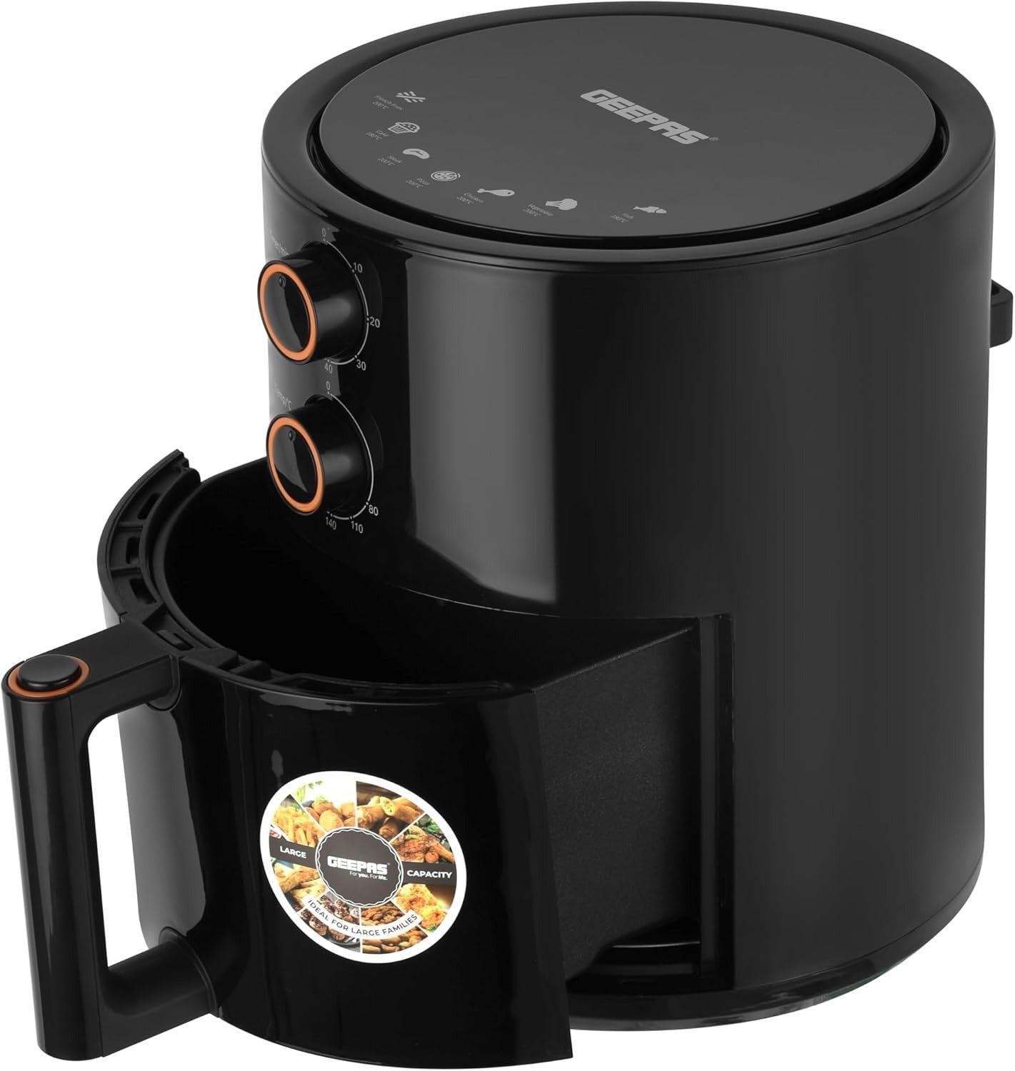 Black air fryer with side handle and control panel, circular air vents on top