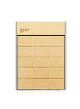 Box of yellow rectangular erasers labeled ERASER 30 pcs