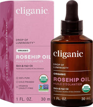 Organic rosehip seed oil bottle and pink box with dropper, 1 fl oz