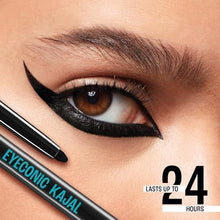 Black matte kohl liner pencil beside a bold winged eye liner on an eye