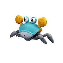 Blue electric crab crawling toy with orange claws, big eyes, and gray legs