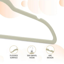 Ivory velvet clothes hanger close-up with arced bar and 360 swivel hook