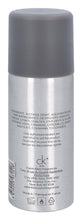 CK One deodorant spray bottle with back label showing ingredients and directions