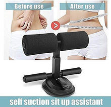 Black sit-up assistant bar with foam grips and round suction base