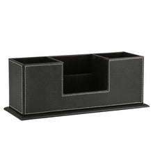 Black PU desk organizer with four divided compartments and open center storage well.