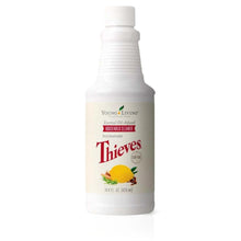 Young Living Thieves household cleaner bottle with lemon artwork, white cap