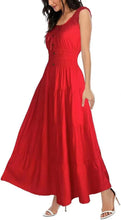 Red sleeveless tiered long dress with flared skirt and smocked bodice
