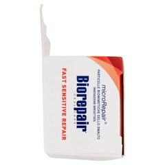 Open white Biorepair product box with blue logo and orange accents Biorepair toothpaste for sensitive teeth