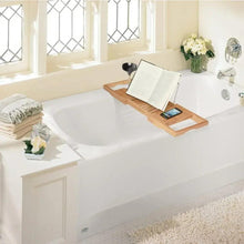 Adjustable bamboo bathtub tray with backrest holding an open book and smartphone