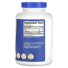 Nutricost coconut oil softgel supplement bottle, Supplement Facts panel and blue label