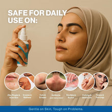Person in headscarf applying facial mist spray from a small bottle to face