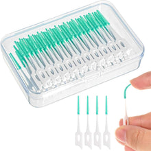 Interdental brushes set with soft green bristles, white handles, in clear storage case