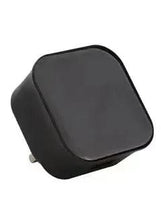 Black USB phone charger adapter with rounded front and prongs